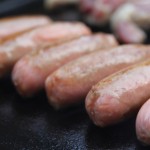 Australia Day Barbecue: Würstchen auf dem Grill Würstchen auf dem Grill